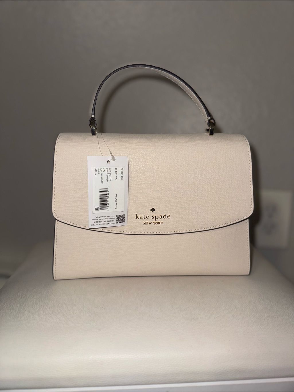 Kate Spade Cream Top-Handle Pebbled Leather Satchel
